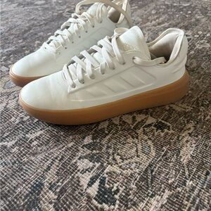 Adidas men’s or women’s  White and Brown Sneakers